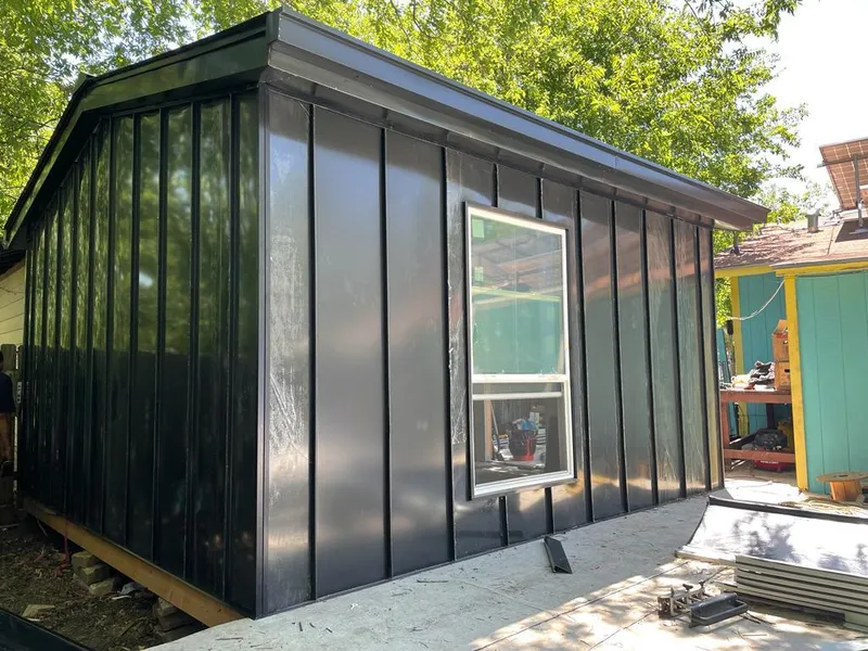 Black standing seam metal wall panels for Roof Inspection in Kannapolis